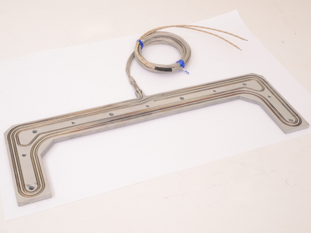 Pressure plated strip heaters